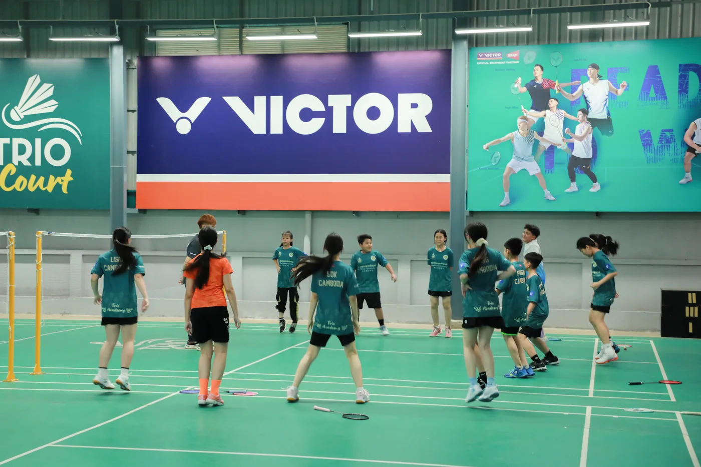 Trio Court Badminton Action — Best Value Club